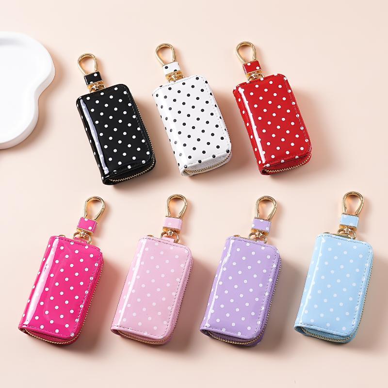 Gepunktetes, glänzendes Schlüs – Men Accessories In Store Bewertung und Preis